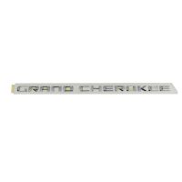 Emblem on the side of the door * Grand Cherokee *
